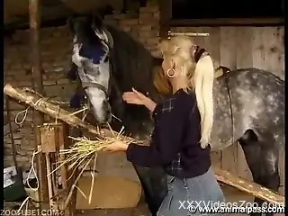 Ponytailed mommy getting fucked by a hung stallion