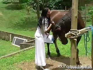 Skanky veterinarian sucking on a horse's huge cock