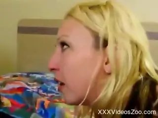Black and horny dog fucking a blonde on a huge bed