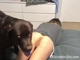 Dog humps nude blonde woman in the ass and pussy
